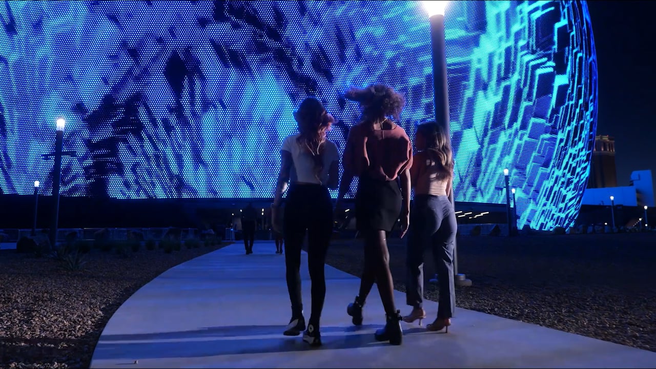 Postcard from Earth — visitors approaching the Sphere